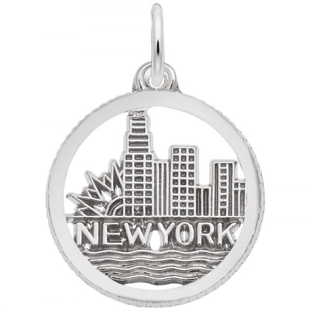 The Rembrandt Charms New York Skyline Charm in sterling silver is expertly crafted in the shape of a circular pendant, depicting the iconic New York skyline with "NEW YORK" inscribed beneath it. This elegant design beautifully captures the cityscape and waves symbolizing water. It includes a top loop for easy attachment to a chain or necklace.