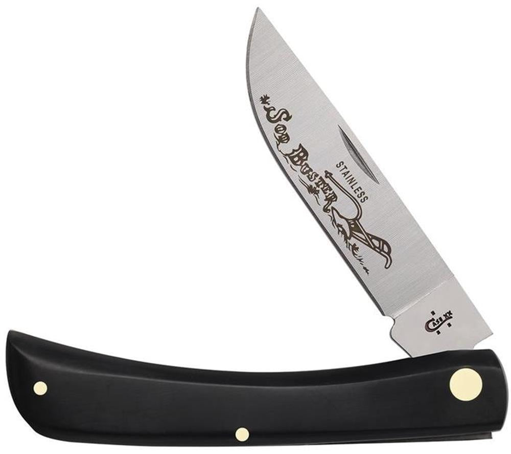 A partially unfolded Black Synthetic Smooth Sod Buster pocket knife from W.R. Case & Sons Cutlery Co., featuring a stainless steel blade with decorative engravings and the word "Sowbelly" etched on it. The handle is made of sleek black synthetic material with brass rivets.