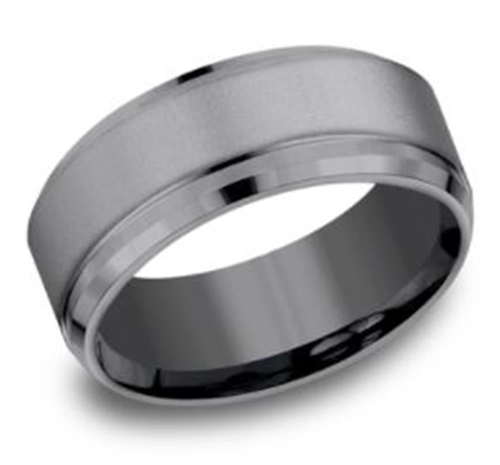 The 9mm Tantalum Sandblast and Beveled Edge ring by Benchmark Rings is a sleek, silver metallic piece featuring a simple, polished design. It boasts a smooth band and slightly beveled edge, offering a modern, elegant look.