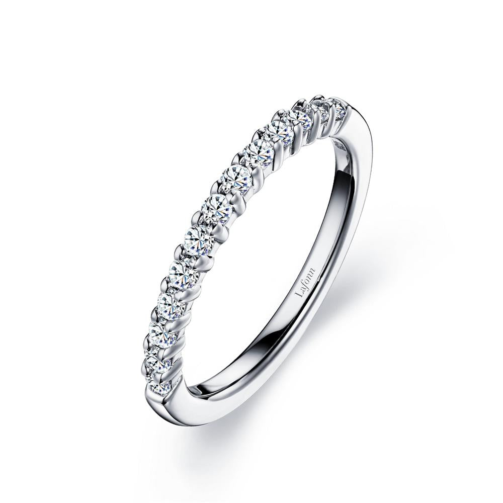 Introducing the Lafonn Half-Eternity Band Ring—a polished, reflective platinum band that exudes elegance with its minimalist design. This sleek ring is adorned with a row of evenly spaced, sparkling round-cut diamonds along the top half, making it a timeless addition to any jewelry collection.