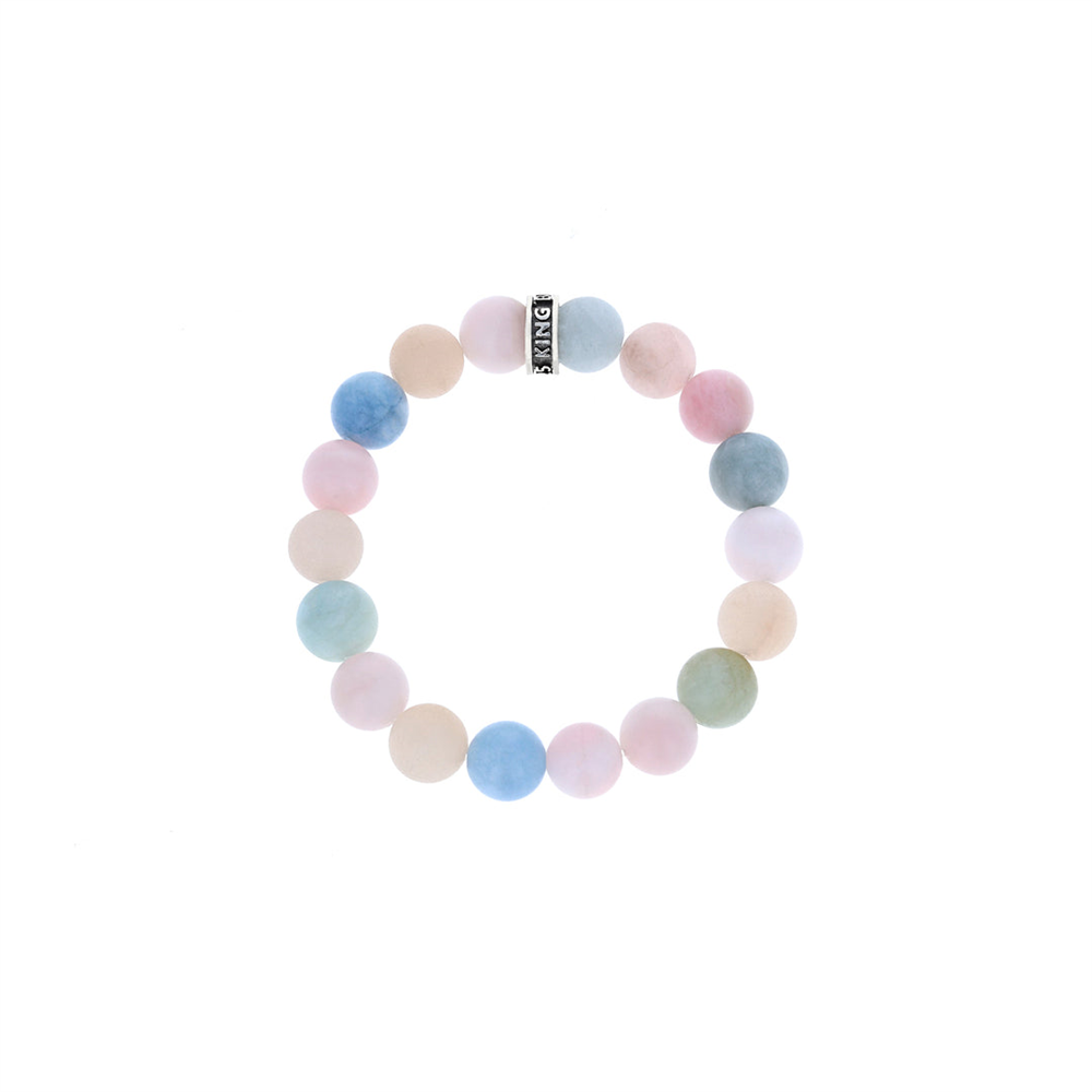 The King Baby 10mm assorted aquamarine bracelet showcases pastel pink, blue, green, and cream beads. It features a small silver cylindrical logo bead engraved with text and is displayed against a white background.