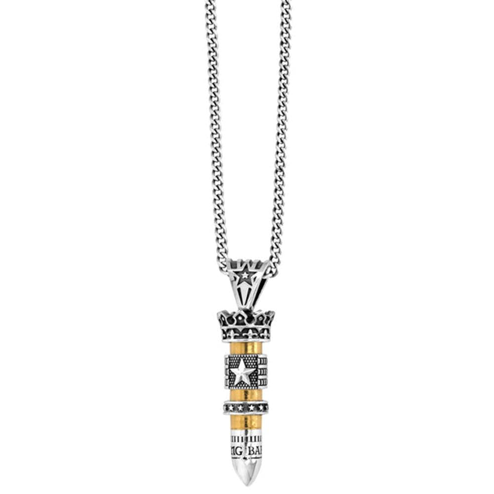 The .38 Special Bullet Silver Necklace by King Baby features a sterling silver pendant intricately shaped like a detailed bullet. Handmade in the USA, this pendant is adorned with gold and silver accents, a star design, and intricate patterns, giving it a bold and stylish appearance. The chain boasts a simple yet elegant link design.