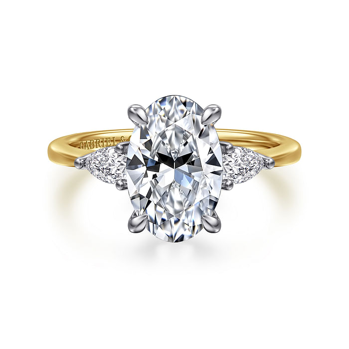 The Gabriel & Co 14K yellow diamond engagement ring (SO:1961424, size 6.5) features an 11x7.2mm oval center diamond, pear-shaped side stones, and a polished white metal prong setting for timeless elegance.