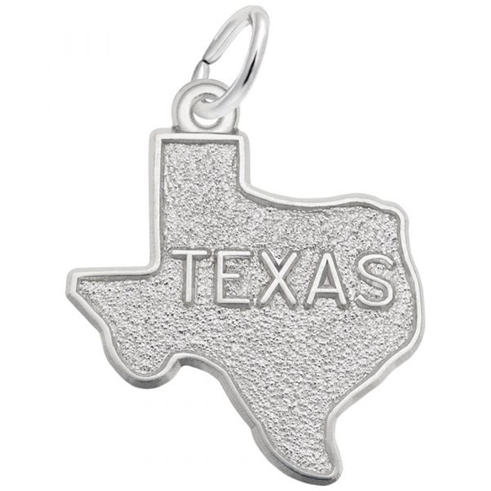 The Rembrandt Charms Texas silver pendant has a textured surface, is shaped like the state of Texas, and features "TEXAS" engraved in bold letters. It includes a small loop for attaching to a necklace or bracelet.