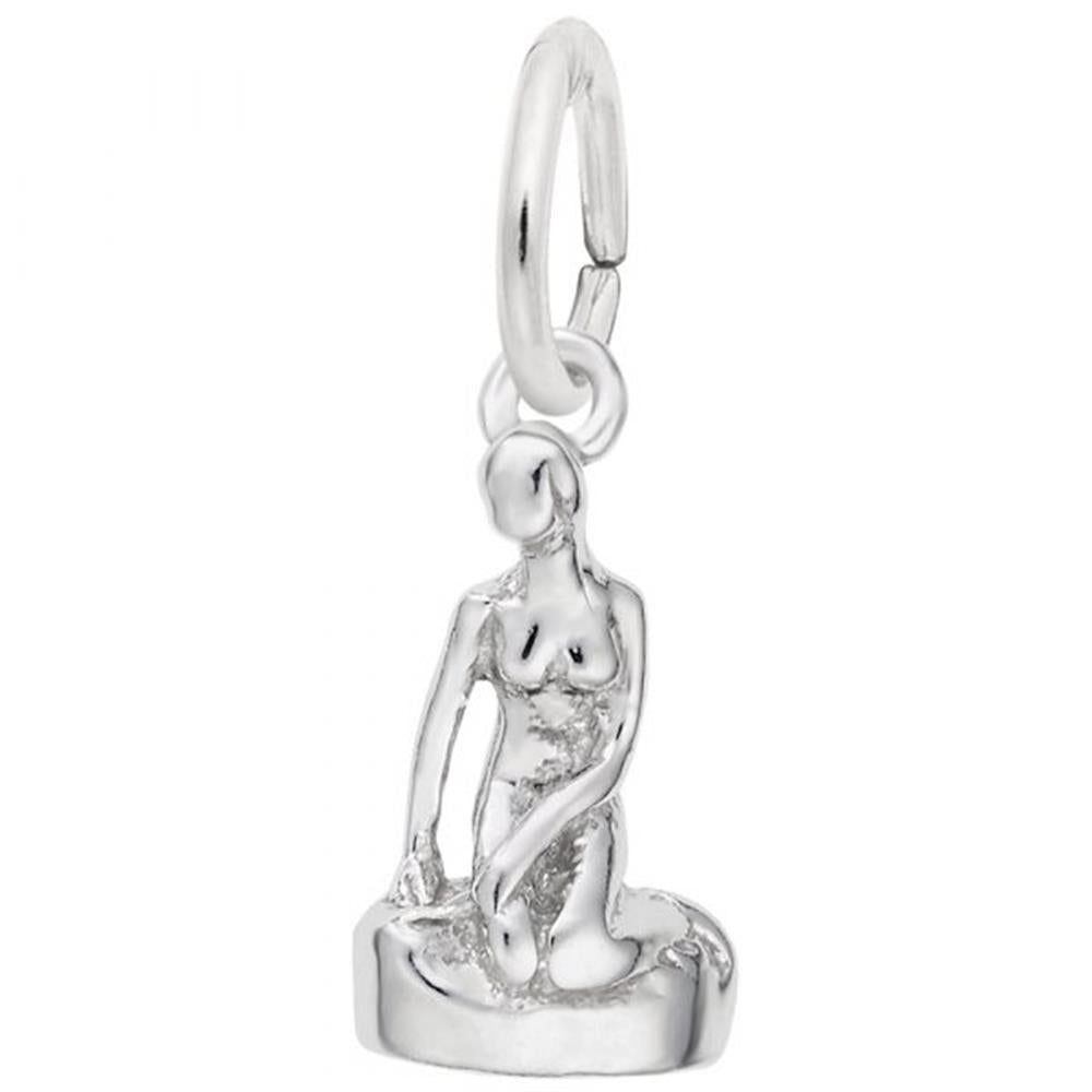 A detailed image of the Sterling Silver Danish Mermaid Charm by Rembrandt Charms. This charm features an intricately crafted mermaid, measuring 0.26 inches by 0.52 inches (6.59 mm by 13.18 mm), capturing the elegance and mythical beauty of the iconic Copenhagen mermaid. The charm has a polished sterling silver finish, perfect for adding a touch of enchantment to any charm bracelet or necklace. Style number 1432.