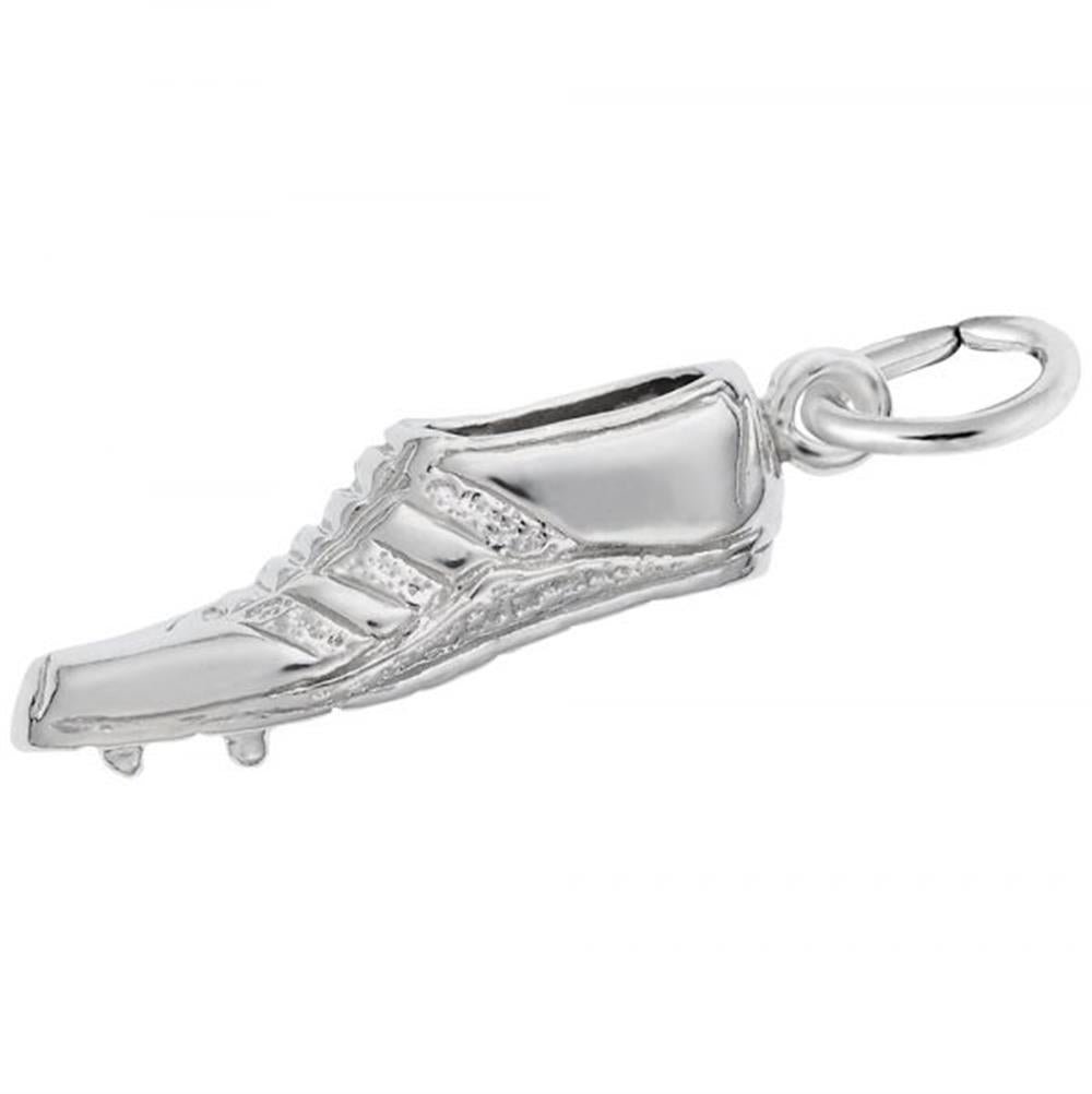 The Track Shoe Charm by Rembrandt Charms is a finely detailed, small metal charm modeled after a soccer cleat, complete with studs and laces. Crafted from sterling silver, it features a shiny finish and includes a loop attached to the heel for easy hanging or attaching to a chain or bracelet.