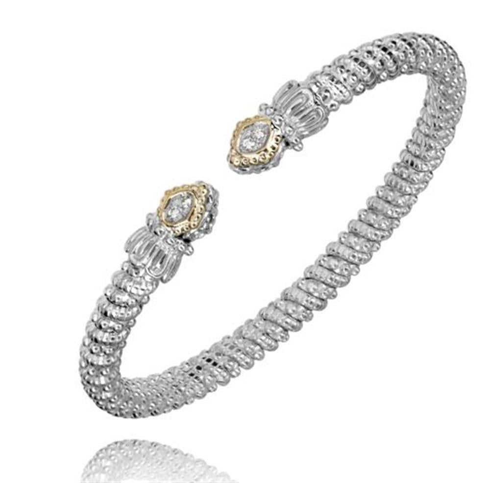 Introducing the Alwand Vahan Jewelry 4MM Band 0.06ct – a sparkling silver bracelet featuring an intricate, beaded design. This elegant piece showcases two decorative end pieces with gold accents and small central gemstones, creating a touch of refinement. The open-ended, highly polished bracelet is perfectly sized for Size B2 wrists under the model number 22013D.