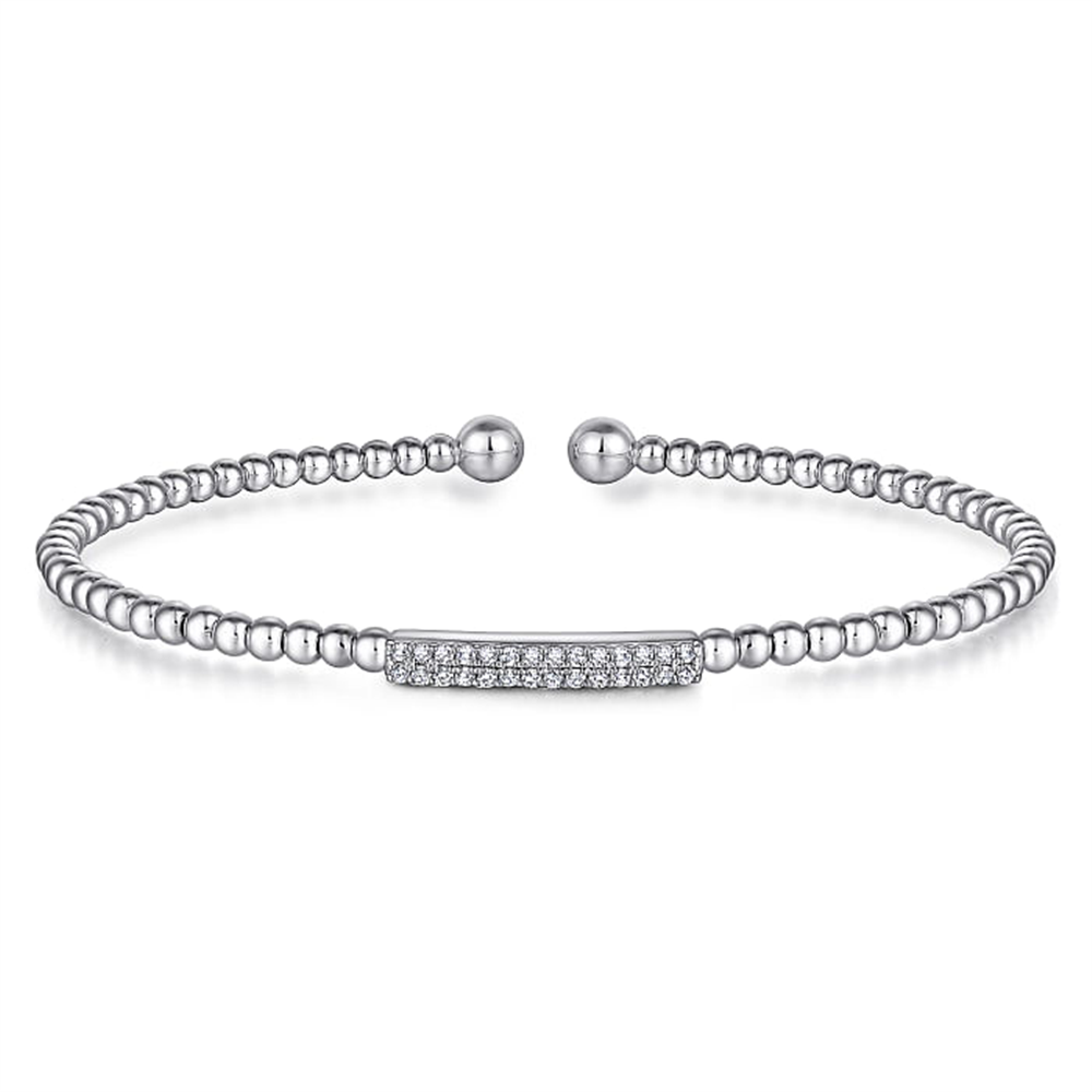 The 14K White Gold Bujukan Bead Bangle with Diamonds by Gabriel & Co is a delicate silver bracelet featuring small, round beads strung together with a central rectangular bar encrusted with sparkling crystals. Its adjustable ball ends ensure a comfortable fit, making this piece both elegant and versatile.