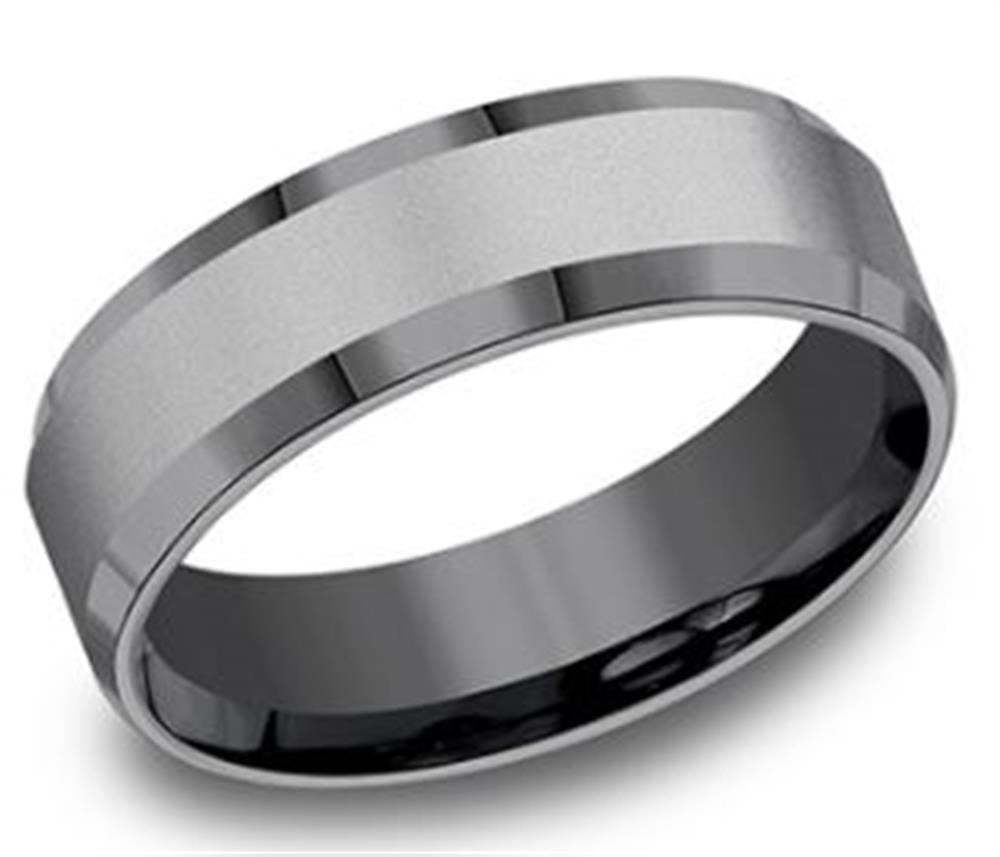 Introducing the 7mm Tantalum Sandblast and Beveled Edge from Benchmark Rings: a sleek, modern ring crafted from tungsten carbide. This elegant piece boasts a matte center finish, polished beveled edges, and features a solid, durable appearance with a smooth inner band that incorporates tantalum for added strength and style.