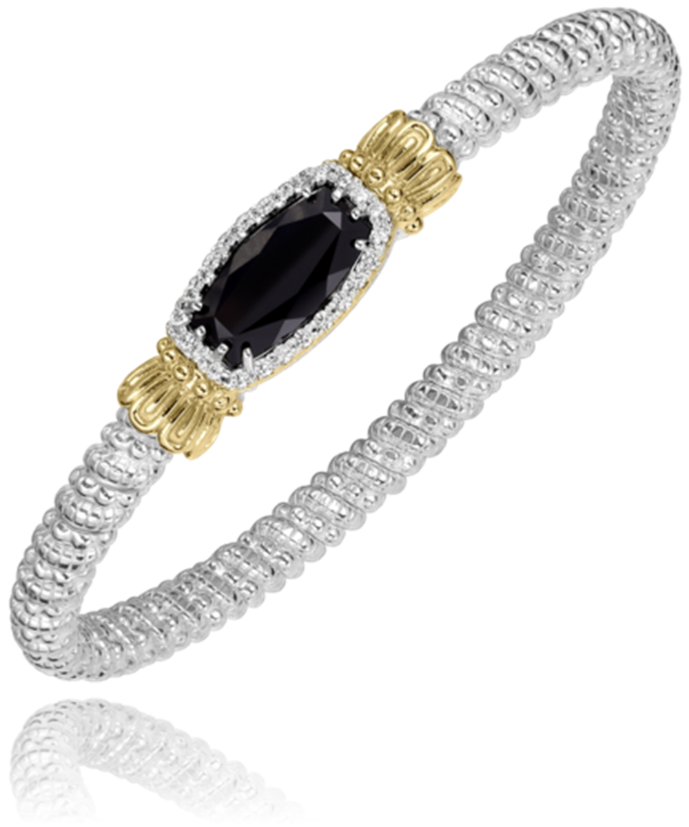 The 4MM ONYX bracelet by Alwand Vahan Jewelry features a textured silver design, centered around a 4mm oval onyx, elegantly surrounded by small sparkling stones and enhanced with gold accents for added sophistication.