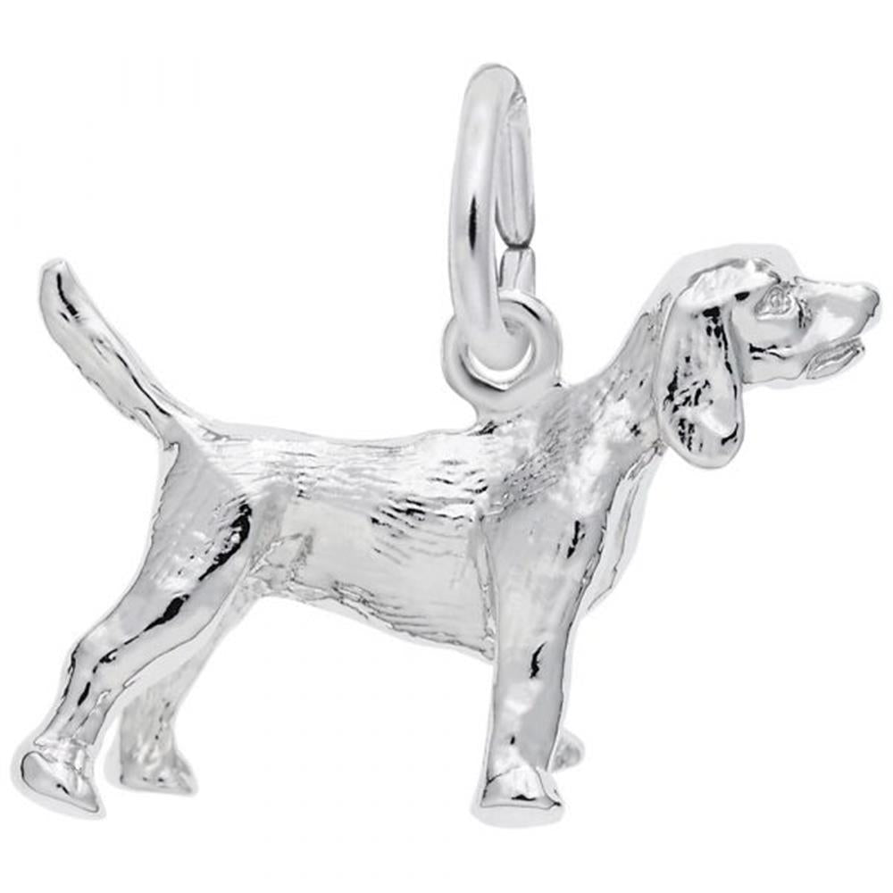 The Beagle Dog Charm in sterling silver by Rembrandt Charms features a detailed beagle with its tail raised and head turned slightly to the side. The charm showcases intricate details such as ears, eyes, and fur texture, and includes a small loop at the top for easy attachment to a bracelet or necklace.