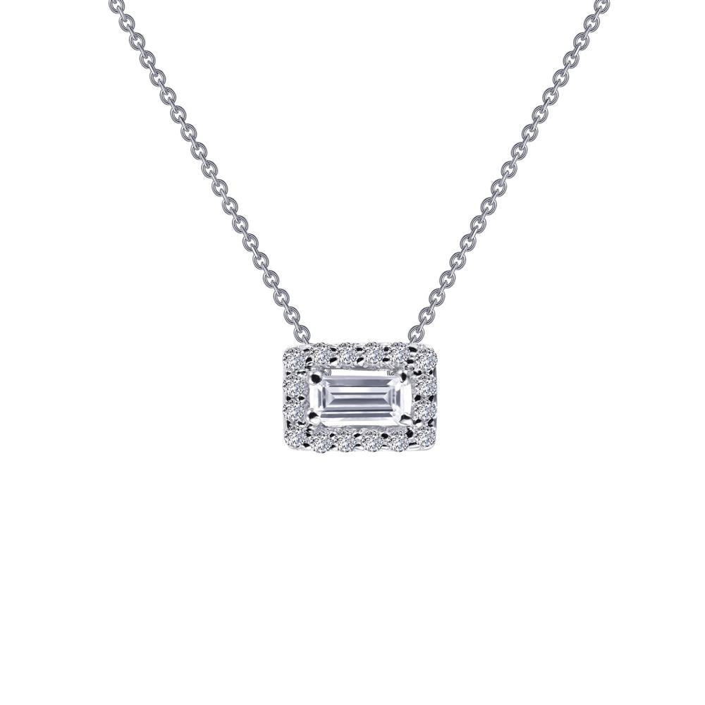 The Baguette Halo Necklace by Lafonn showcases a modern and elegant design with a sterling silver rectangular pendant. The central gemstone features an emerald cut, beautifully framed by a border of smaller round stones, making it an exquisite piece to wear for any occasion.