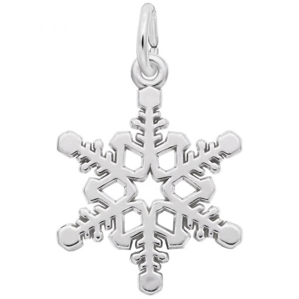 The Rembrandt Charms Snowflake Charm in sterling silver boasts an intricate hexagonal design with detailed symmetrical cutouts on each arm, complete with a small hoop at the top for attaching to a chain.