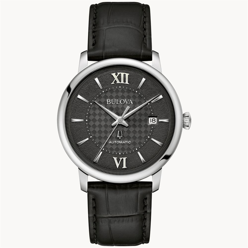 The Bulova Hudson Black Dial Leather Strap Watch by Bulova Watch Company features a black leather strap, silver case, sapphire crystal, black textured dial, silver markers, Roman numerals at 12 and 6, date at 3 o'clock, and "AUTOMATIC" above 6.