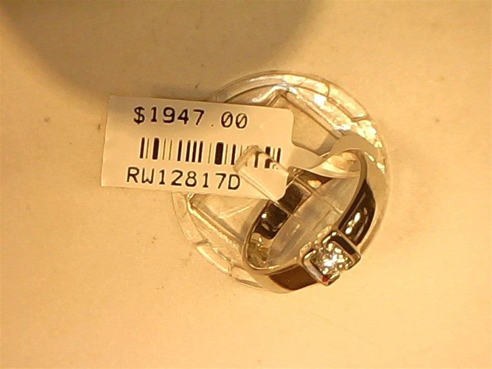 A Ryan Gems Half Bezel Round Diamond Band in 14k white gold, size 6.75, is displayed on a white surface with a price tag showing "$1947.00" and code "RW12817D".