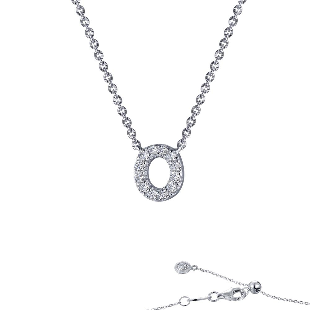 The Letter O Pendant Necklace by Lafonn features a small oval pendant encrusted with sparkling white gemstones. The delicate chain includes an adjustable clasp and a captivating design, complete with a small round charm near the clasp.