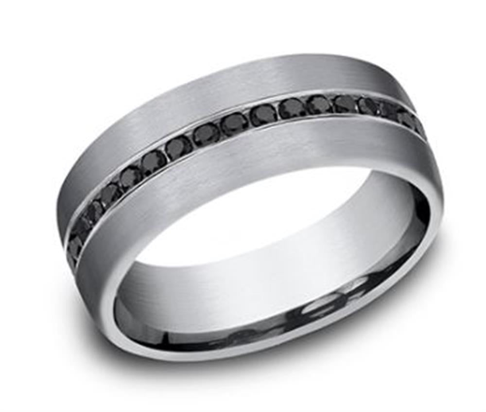 The 7.5mm Satin Tantalum 0.40cts Black Diamonds Channel Set Ring by Benchmark Rings features a sleek silver band with a central row lined with small black diamonds. The matte finish of the tantalum contrasts beautifully with the glossy stones, creating a modern and elegant look. This ring also boasts smooth, rounded edges and an unembellished interior for added comfort.