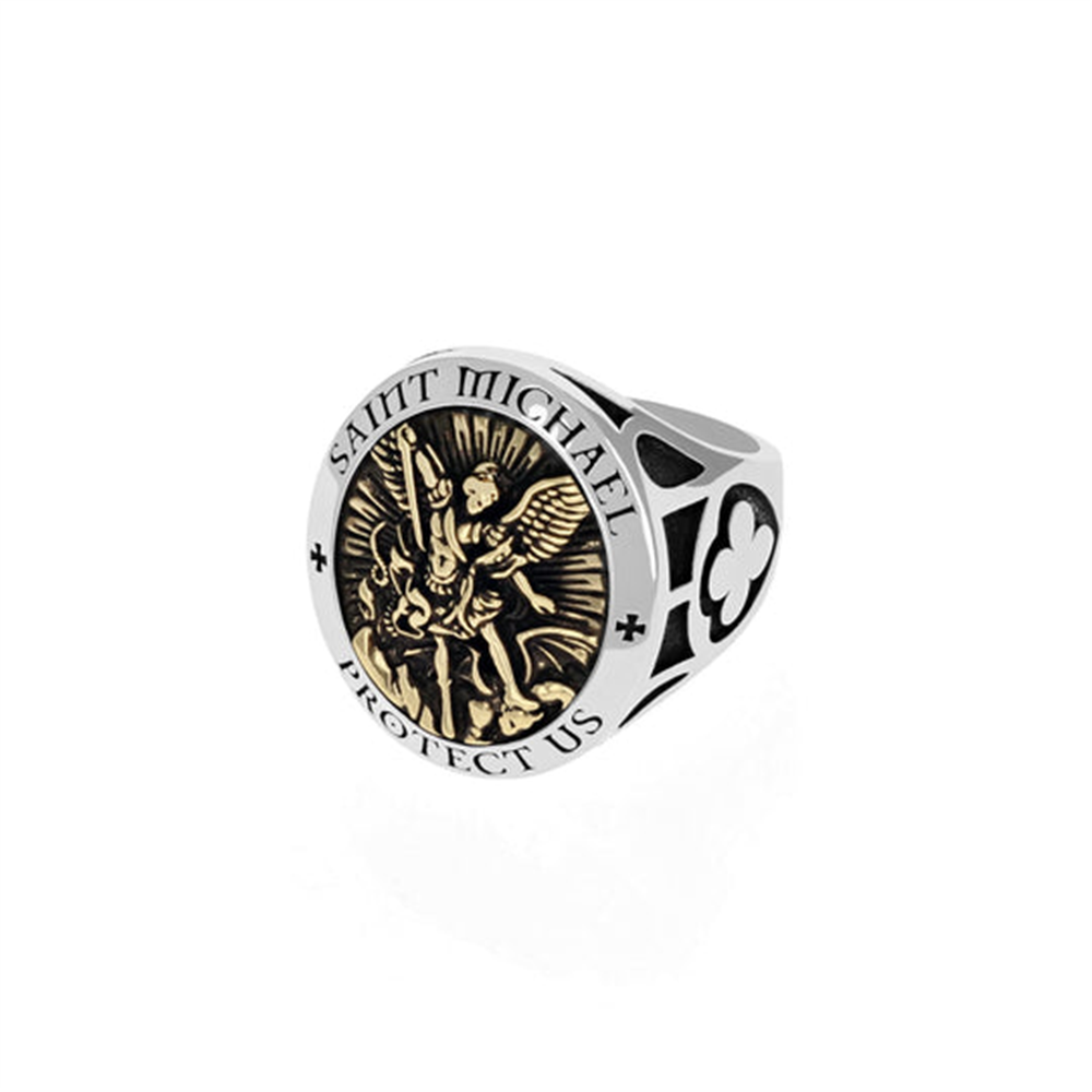 The King Baby Saint Michael Ring W/Gold Alloy features a silver band with a gold alloy image of Saint Michael defeating a demon on its round face, encircled by "SAINT MICHAEL PROTECT US" and flanked by cross symbols.