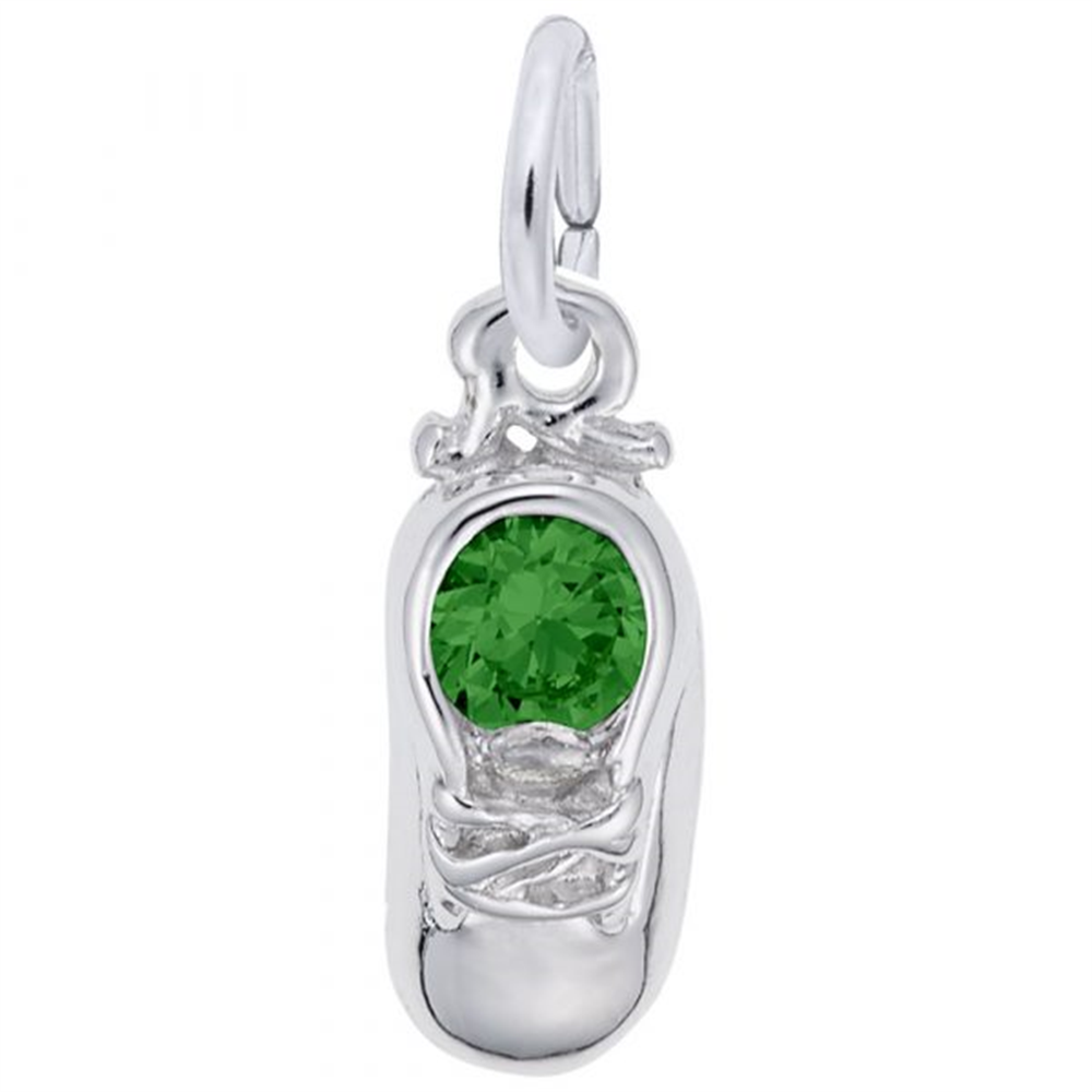 The Rembrandt Charms Sterling Silver Charm, also known as "Sterling Silver Baby Shoe May," features a delicate baby shoe pendant with intricate lace details and is adorned with a small green gemstone. The charm has a ring for easy attachment to your favorite chain.