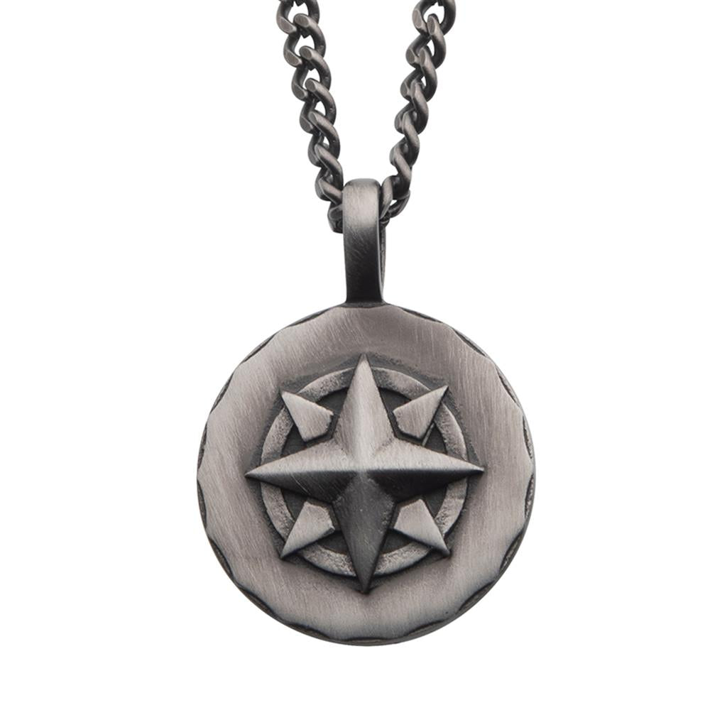 The Gun Metal IP Compass Medallion Pendant with Chain by INOX features a circular medallion adorned with a prominent raised eight-point star at the center. It boasts a weathered, antique finish and is Gun Metal Plated for a rugged, timeless look.