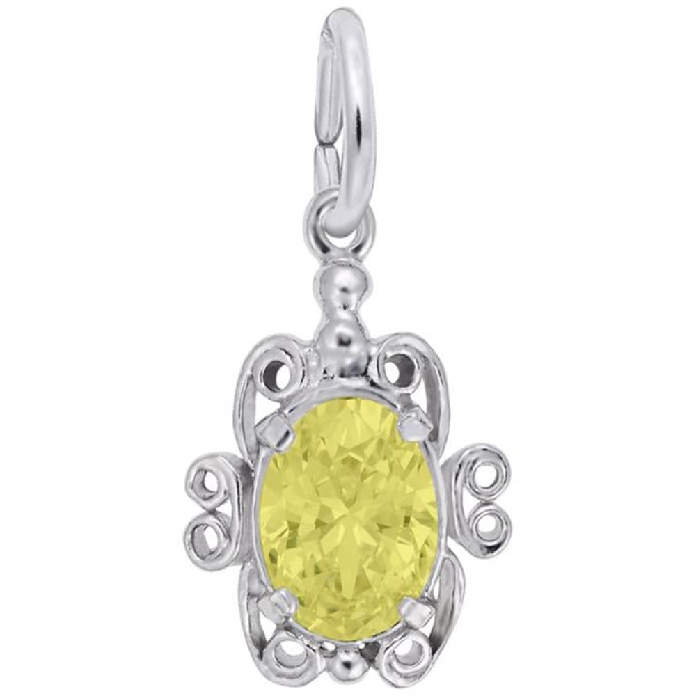 The Rembrandt Charms Filigree November Stone Charm is a silver pendant showcasing an intricately designed turtle-shaped frame with an oval Citrine birthstone at its center. The turtle's legs and head are stylized, and a small loop is attached at the top for easy attachment to a chain or cord. This charm adds a touch of elegance to any outfit.