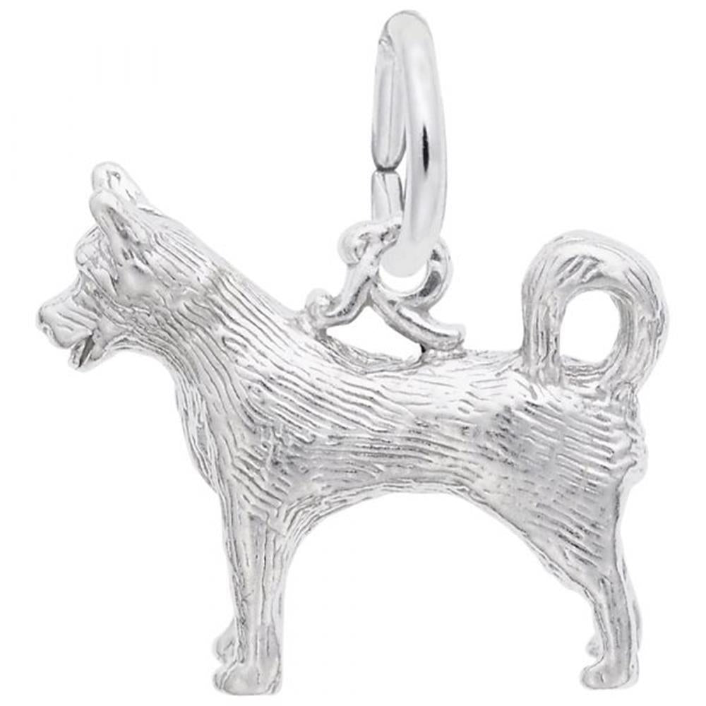 The Rembrandt Charms Husky Charm, crafted from sterling silver, showcases a detailed, textured design of a standing Husky with a curled tail and pointed ears. It includes a round loop at the top for easy attachment to a pendant or bracelet.