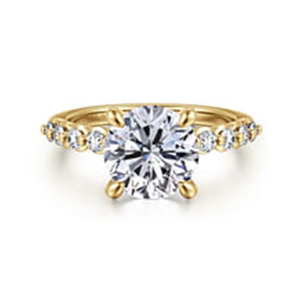 The Gabriel & Co 14K yellow diamond engagement ring (SN: S207933) features a 7.4mm round centerpiece accented by smaller diamonds on the band. Available in size 6.5.