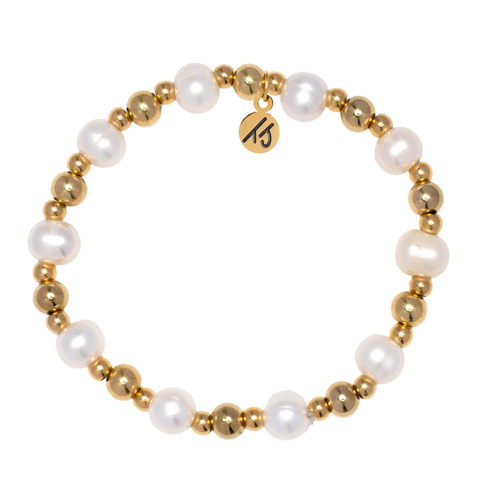 The Gold Day by Day Collection - Pearl Gemstone Bracelet by T Jazelle features alternating white pearls and gold beads, plus a round gold charm engraved with a stylized "15" to celebrate gratitude.