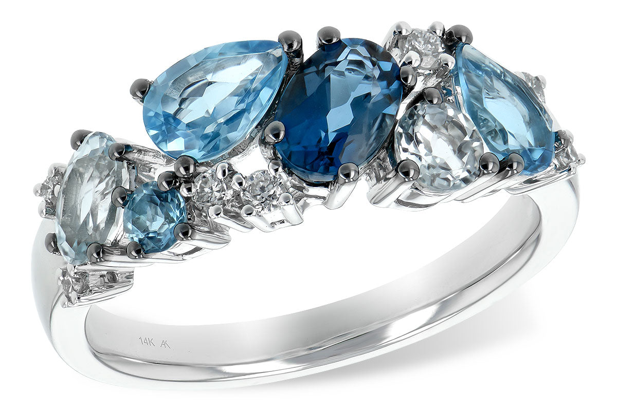 The 14K White Gold Blue Topaz and Diamond Ring by Allison Kaufman showcases oval, pear, and round blue topaz with sparkling diamonds—a stunning choice as a December birthstone or elegant statement ring.