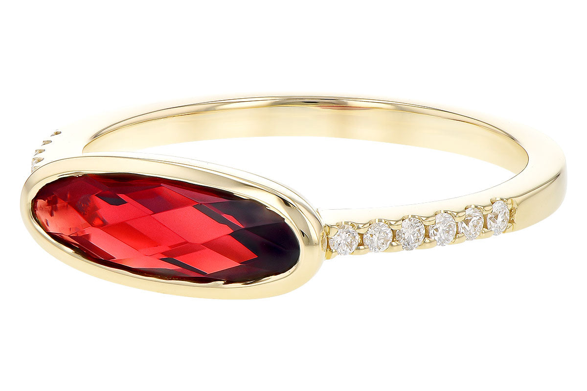 The Allison Kaufman 14K Yellow Gold Garnet and Diamond Ring showcases an elongated, faceted red garnet set horizontally, accented by small round diamonds along one side of the band.