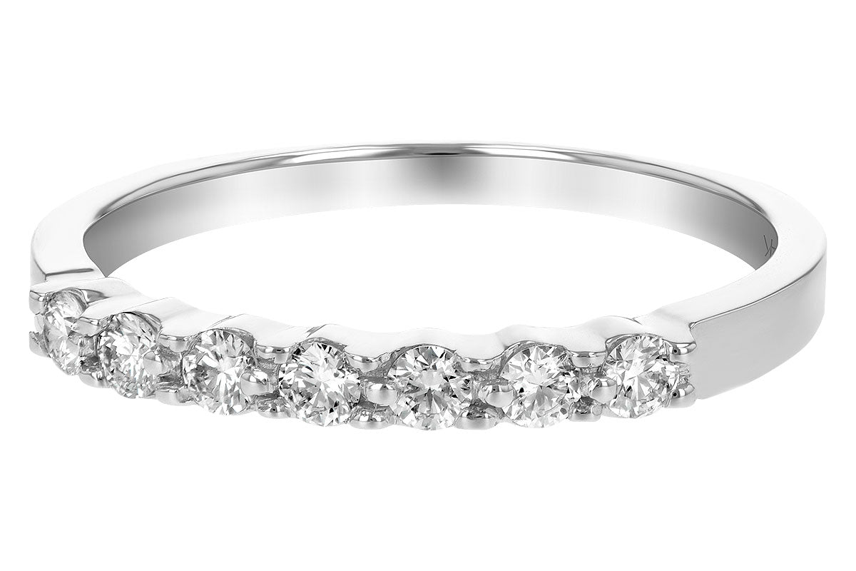 The Allison Kaufman 14K White Gold 7-Stone Diamond Wedding Ring features seven round diamonds set side by side, making it a beautiful choice for an anniversary or as a classic wedding band.