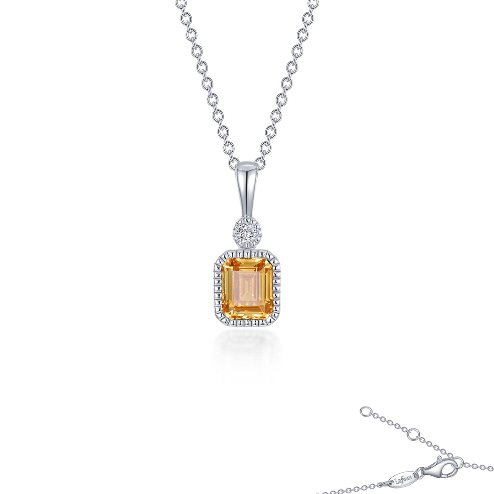 The Lafonn SIMULATED YELLOW TOPAZ; NOVEMBER BIRTHSTONE NECKLACE features a silver chain adorned with a rectangular simulated yellow topaz pendant, symbolizing November’s birthstone. This elegant pendant is encircled by small, clear gemstones and comes complete with a round clasp that can be partially seen at the bottom right corner.
