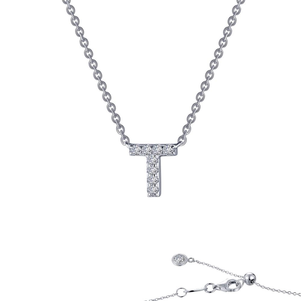 The Letter T Pendant Necklace by Lafonn is a sterling silver chain link necklace featuring a pendant encrusted with clear simulated diamonds. It includes an adjustable clasp and a small attached charm for added elegance.
