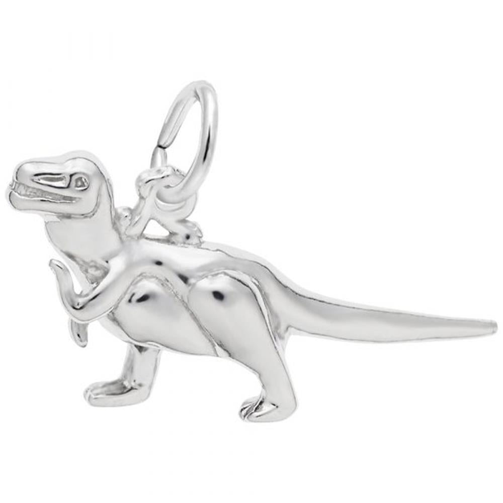 The Rembrandt Charms T-Rex Charm in Sterling Silver features a playful, detailed T-Rex design with a friendly expression and an attached circular loop at the top for easy attachment to a necklace or bracelet.
