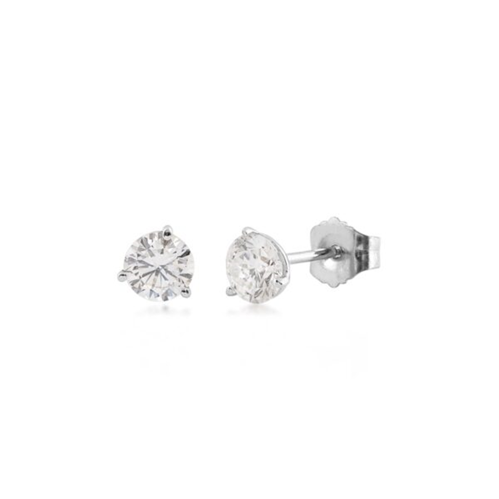 A pair of 14KW Martini Set diamond stud earrings by Simply Diamonds featuring a classic round cut design. These earrings showcase 1 CTTW VS-SI / FGH certified lab grown diamonds, set in a simple four-prong metal setting. One earring is displayed from the front highlighting its sparkling gem, while the other showcases its stud and back closure from the side.