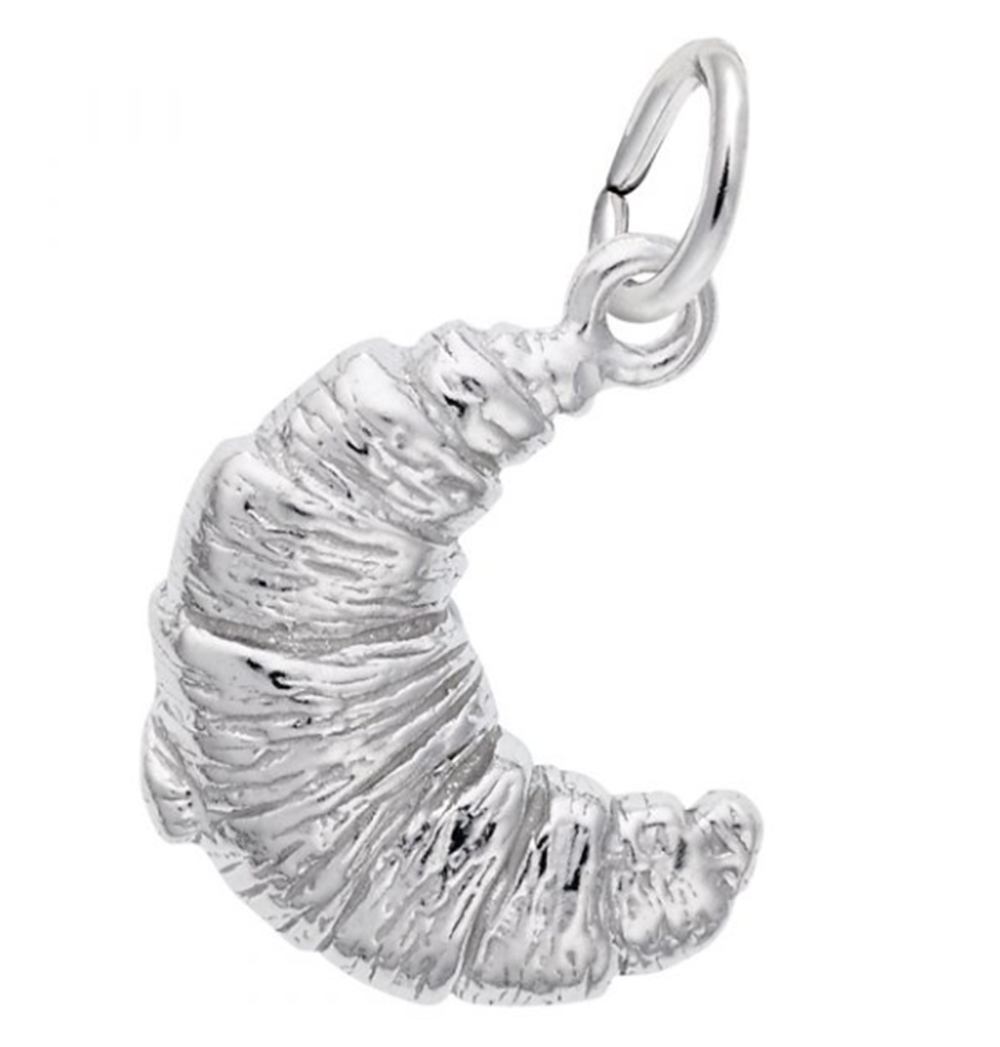 A sterling silver French Croissant Charm by Rembrandt Charms, featuring detailed texture to mimic the pastry’s layers and a small loop at the top for attaching to a chain or bracelet.