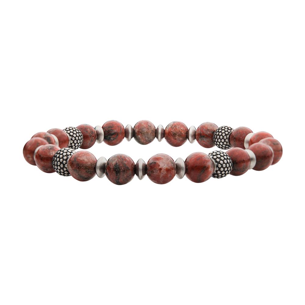 The Men's 8.5mm Rainbow Jasper Stones with Black Oxidized Beads Bracelet by INOX features round, marbled red and black stones interspersed with silver-toned, textured cylindrical spacers on an elastic band. This simple and elegant design makes a sophisticated statement.