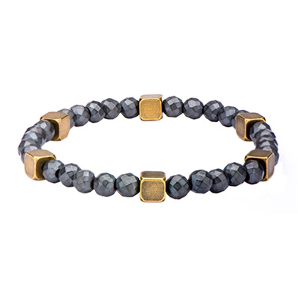 The Men's Grey Hematite with Antiquing Bracelet by INOX showcases small, faceted dark gray hematite beads interspersed with larger golden square beads. This elastic bracelet is arranged in a continuous loop, exuding a sophisticated yet rugged charm.