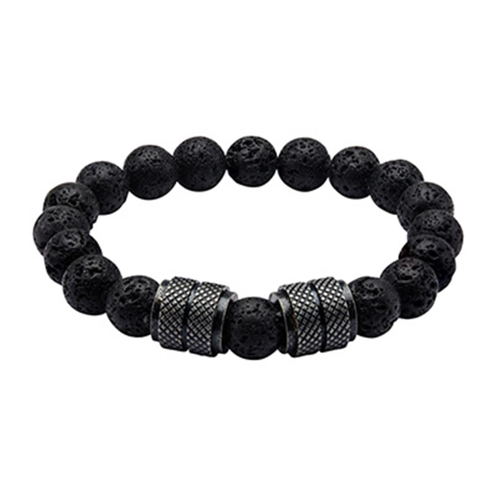 The Men's Stainless Steel Black Bracelet by INOX, measuring 8 1/2 inches, is adorned with round, porous volcanic stone beads. Adding a decorative touch to the design are three metallic cylindrical spacers featuring a textured, crisscross pattern.