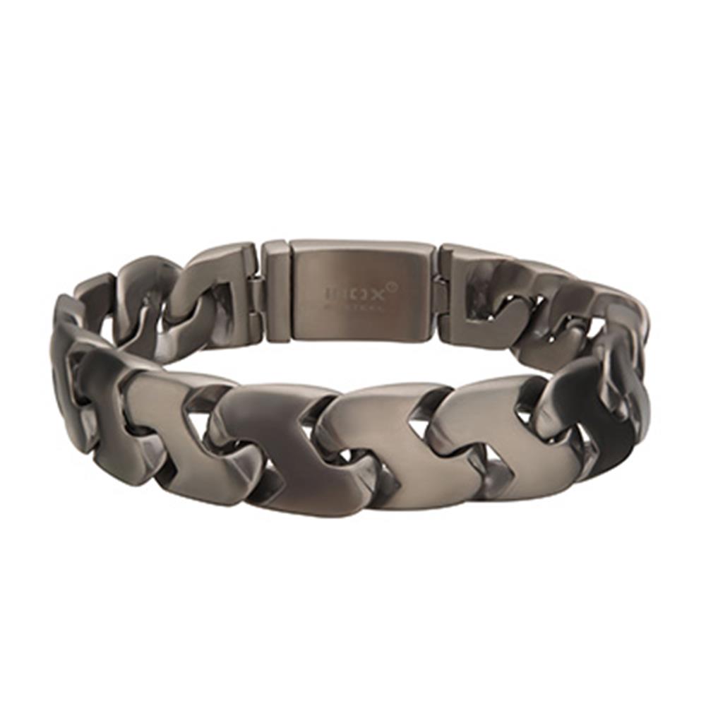 Introducing the Men's Stainless Steel Matte Z-Link Bracelet by INOX, an 8 1/2 inch long, self-adjustable bracelet. Featuring large, interlocking matte links and a secure clasp, this accessory boasts a sleek and modern design that imparts an industrial yet stylish look.