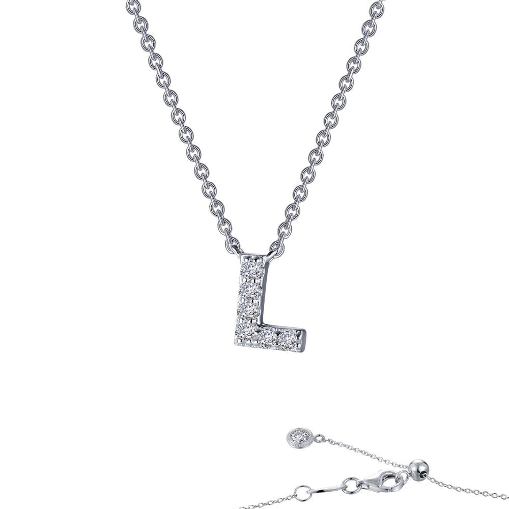 The Lafonn Letter L Pendant Necklace boasts a shimmering silver pendant encrusted with small, sparkling white stones. Its chain showcases a classic, elegant design complete with a clasp and an adjustable length option at the end, allowing for a personalized touch to your jewelry collection.