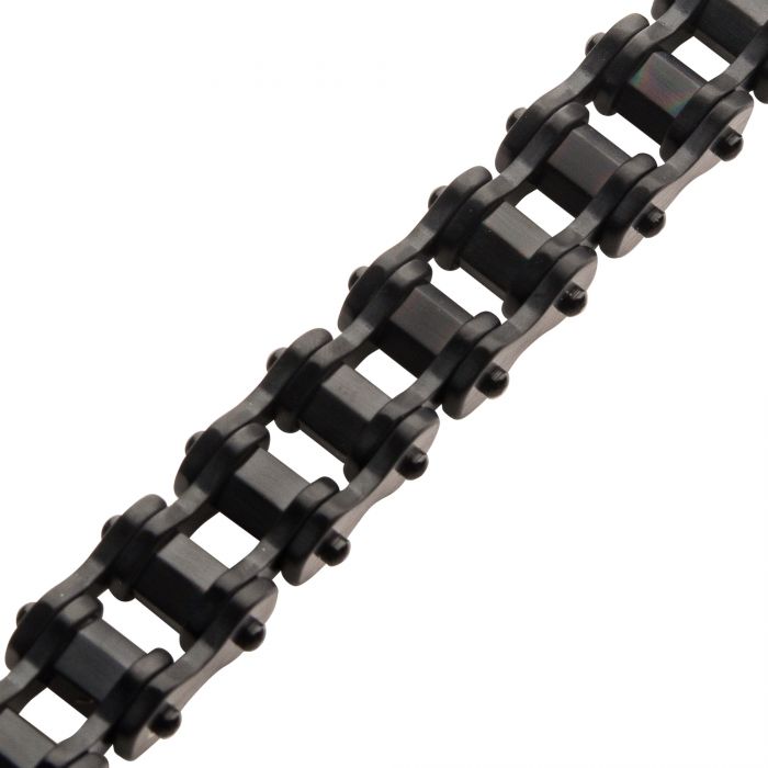 Close-up of the Black Plated Bike Chain Bracelet by INOX with rectangular links and cylindrical pins, arranged in a diagonal orientation against a white background.