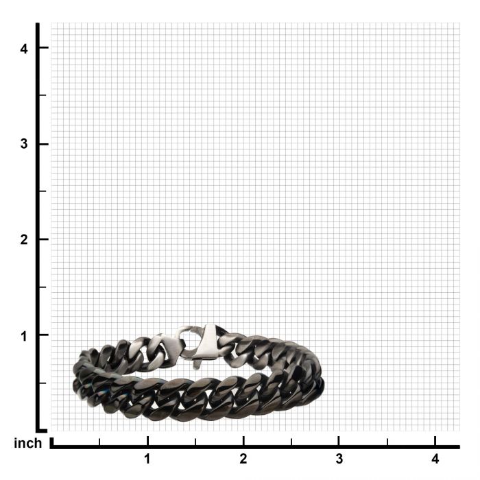 A black, stainless steel reversible big curb chain bracelet from INOX is displayed on a grid background with inch markers along both axes. The Stainless Steel Matte/ Antiqued & Black Plated Colossi Bracelet appears sturdy and well-crafted.