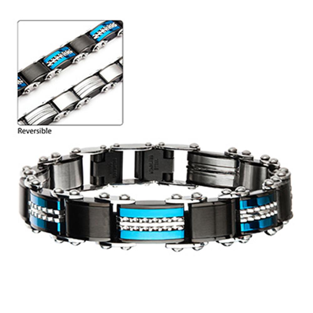 The INOX Men's Double Sided Stainless Steel Black IP and Blue IP Reversible Bracelet boasts a sleek silver and black design on one side and a sophisticated silver and blue finish with small accent stones on the other. This contemporary, industrial-style bracelet is secured with a sturdy clasp.