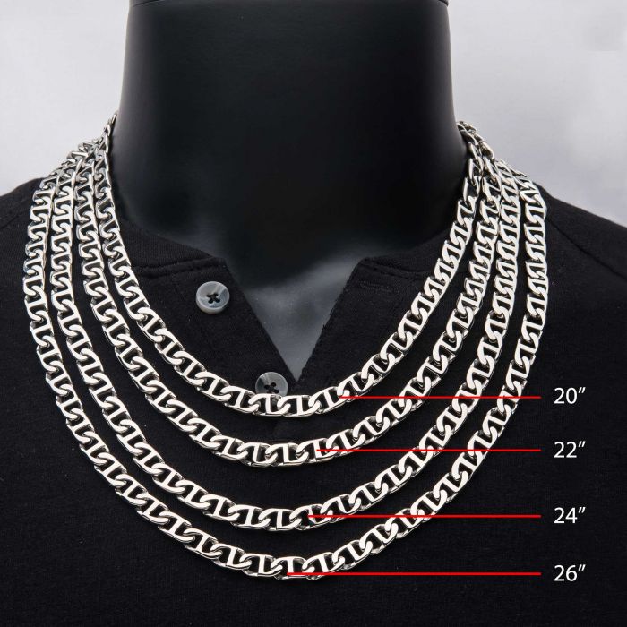 A mannequin dressed in a black button-up shirt showcases four men's stainless steel necklaces of varying lengths. The silver-toned chains, including an 8mm Steel Mariner Link Chain from INOX, are marked in red text as 20 inches, 22 inches, 24 inches (featuring the INOX chain), and 26 inches from top to bottom.