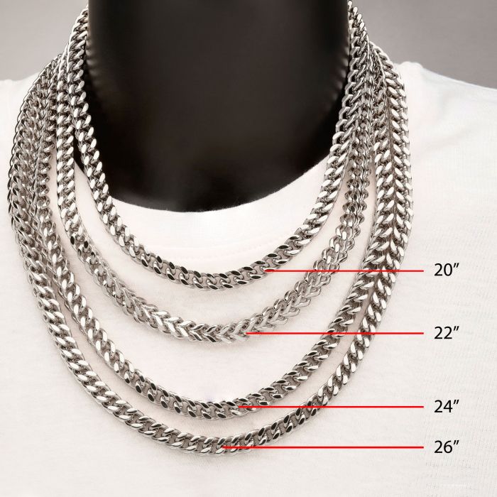 A set of four men's stainless steel necklaces is displayed on a black stand, featuring sleek 4mm Franco chains. These INOX chains are labeled in ascending order by length: 20 inches, 22 inches, the 24-inch "4mm Steel Franco Chain," and 26 inches, all showcased against a white background.