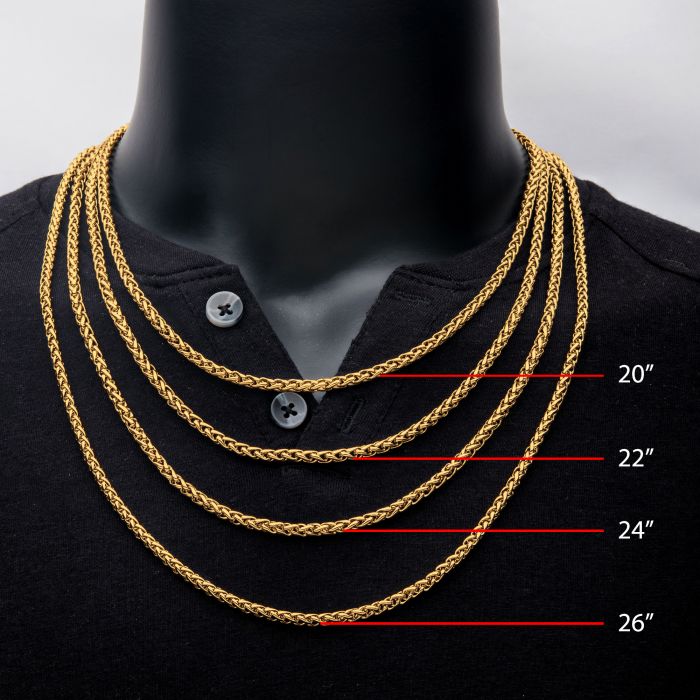A black mannequin with four INOX 18K gold plated 4mm wheat chain necklaces of varying lengths displayed around its neck. The men's stainless steel necklaces are marked with red lines and text indicating 20", 22", 24", and 26" to show their different sizes.