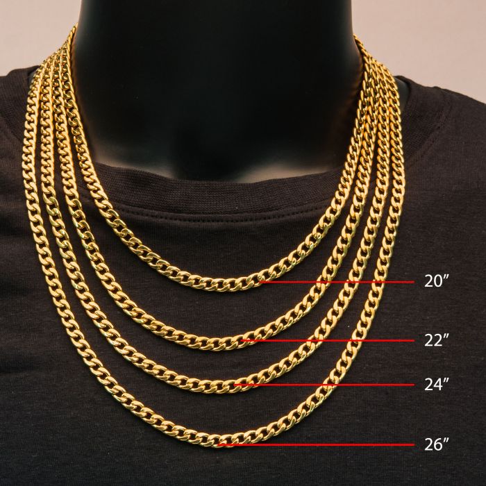 A black mannequin displayed on a black shirt showcases four 18K gold plated INOX men's stainless steel necklaces of varying lengths (20 inches, 22 inches, 24 inches, and 26 inches). Each classic curb chain length is clearly marked with a red line and its corresponding measurement in inches.
