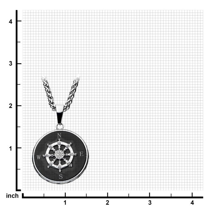A "Stainless Steel Black Plated Ship's Wheel Compass Pendant with Chain" by INOX, featuring a men's compass pendant designed as a ship's wheel with cardinal directions and a decorative center, is placed on a grid marked in inches along the x and y-axes. The grid spans 4 inches by 4 inches.