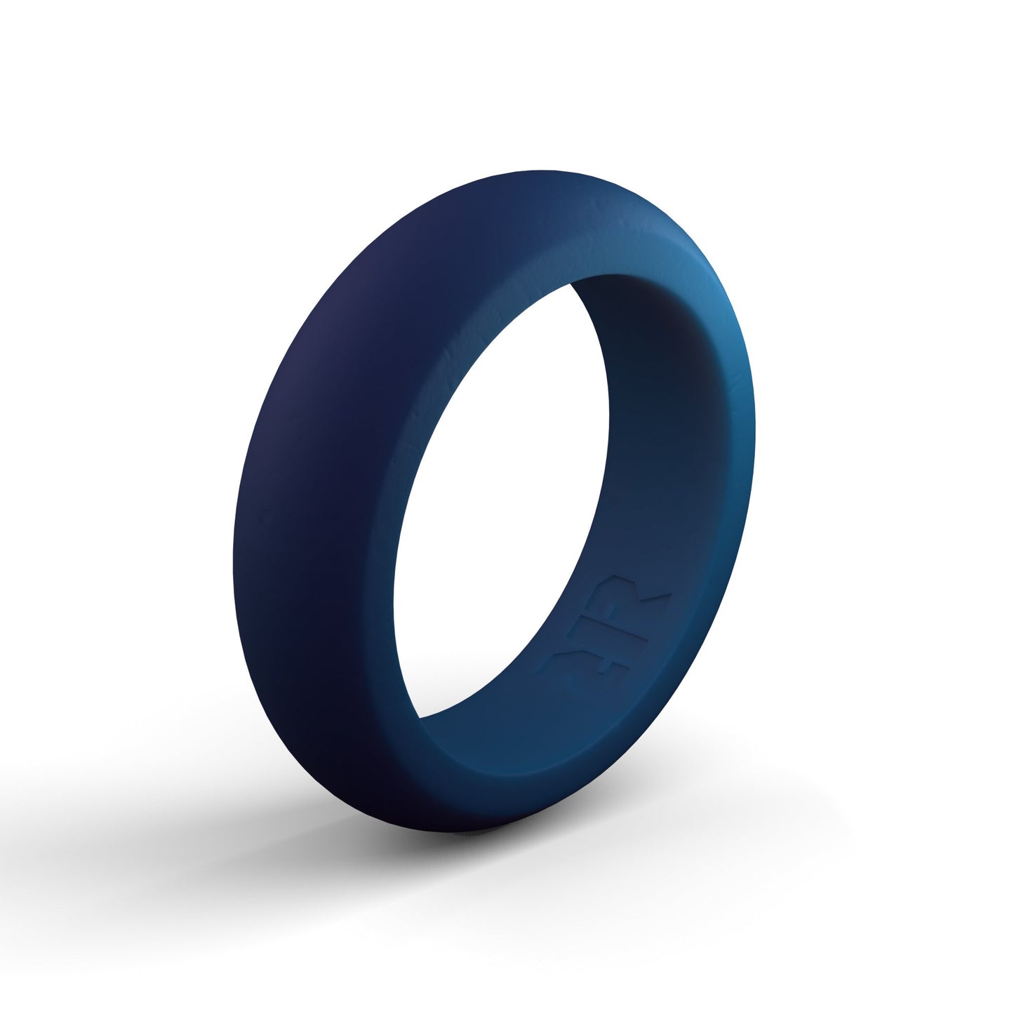 A simple, navy blue ring is shown on a white background. The Women's Navy Blue Silicone Ring by Baxley Jewelry is smooth, unadorned, and casts a soft shadow on the surface. Made from medical grade silicone, the interior of the ring features an embossed logo and text.